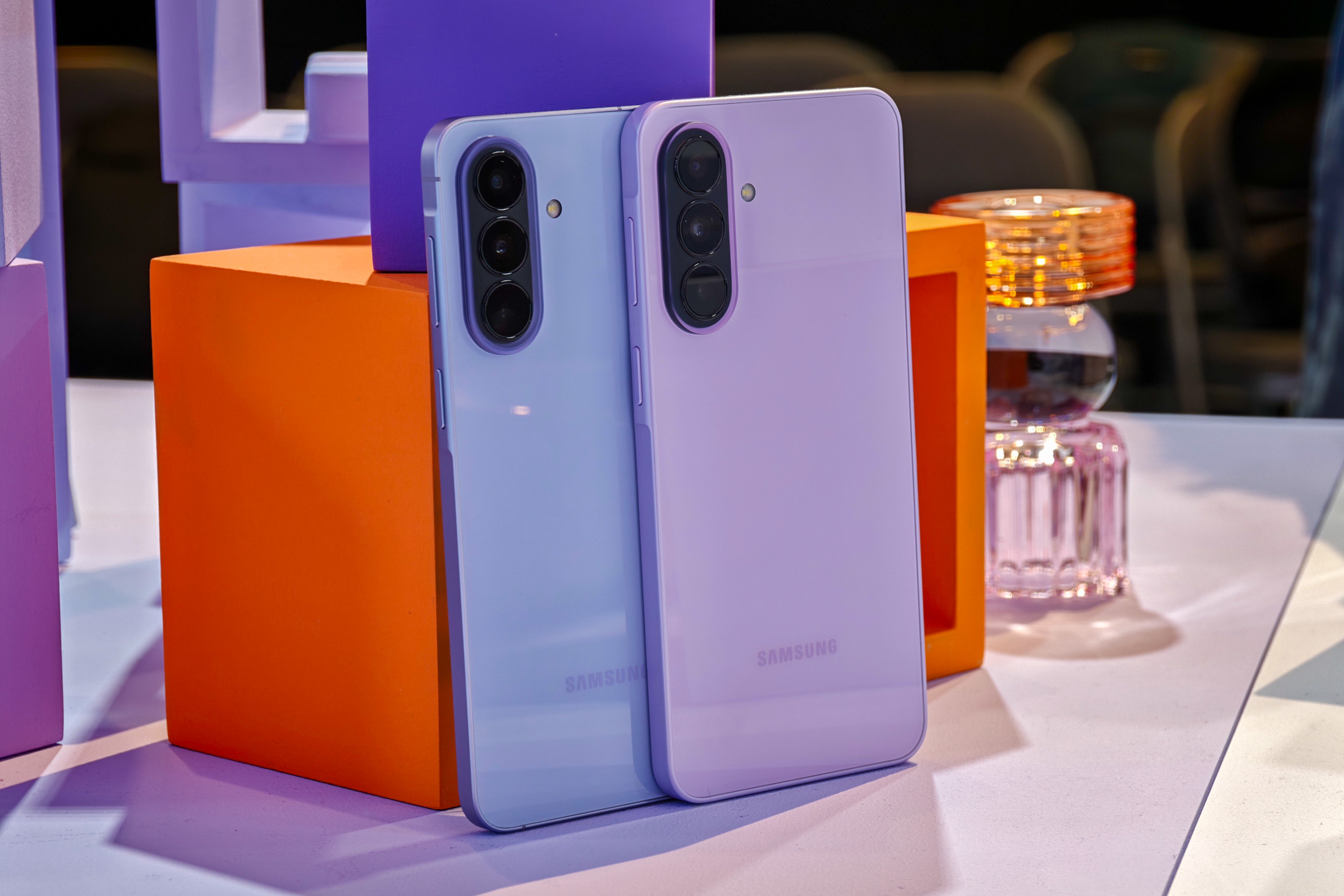Samsung Galaxy A57 and A37 in front of colored cubes