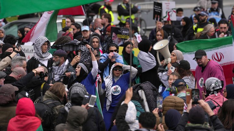 The rally took place on one side of the Thames, with a counter-protest on the other. Pic: PA