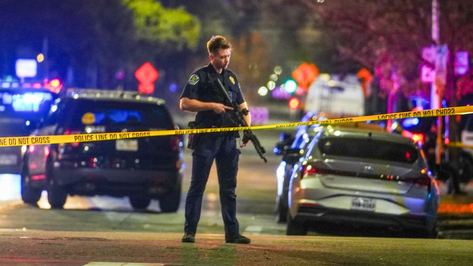 A police officer at the scene on West 6th Street at West Avenue. Pic: AP