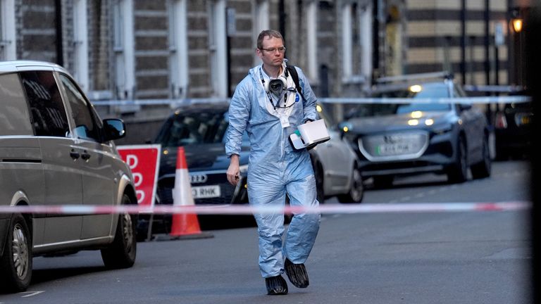 A forensic investigator at the scene. Pic: PA
