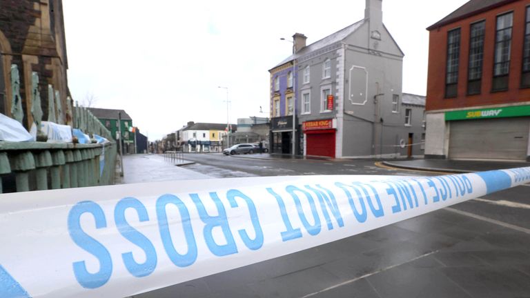 Police tape near the police station in Lurgan after a delivery driver was threatened at gunpoint. Pic: PA