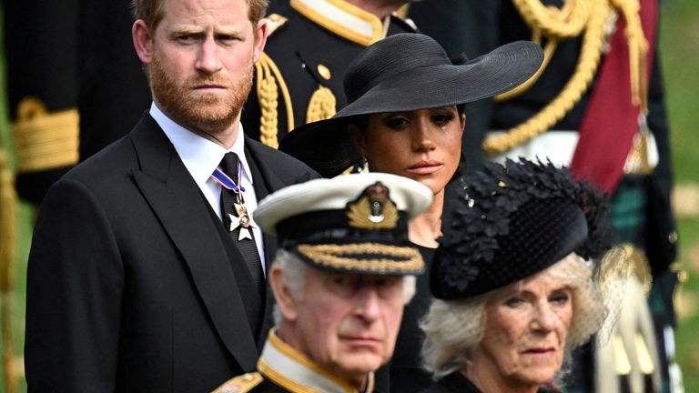 Harry and Meghan are pictured with Charles and Camilla at Queen Elizabeth's funeral. Pic: Reuters