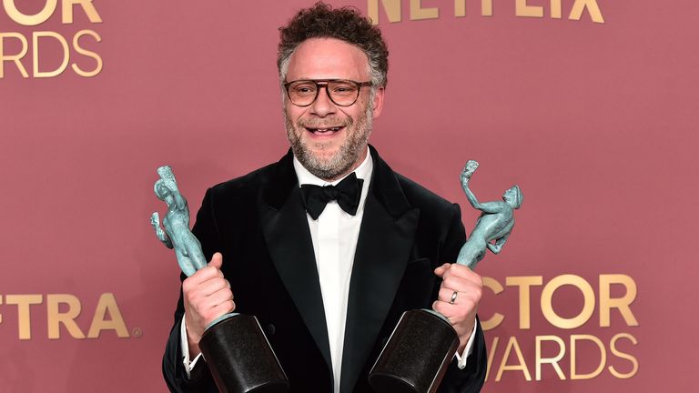 The Studio's Seth Rogan with the show's two awards. Pic: Lisa O'Connor/Shutterstock/Netflix