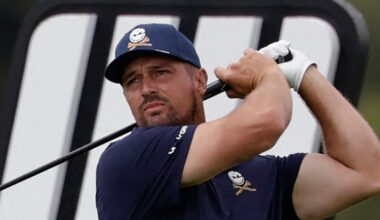 Crushers GC's US player Bryson Dechambeau watches a drive from the 14th tee on the fourth day of the LIV Golf South Africa tournament at The Club in Steyn City on March 22, 2026. (Photo by WIKUS DE WET / AFP)