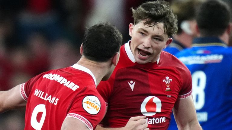 Wales' Daniel Edwards celebrates scoring a drop goal against Italy