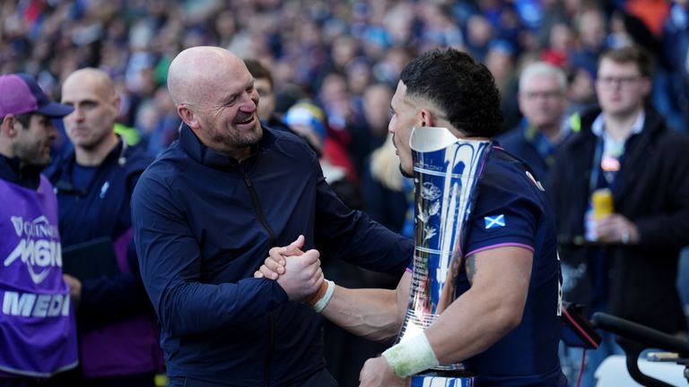 Scotland head coach Gregor Townsend (left) shakes hands with Sione Tuipulotu after beating France