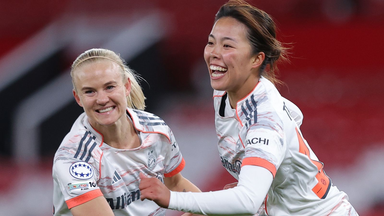 Momoko Tanikawa of Bayern Munich celebrates with Pernille Harder after scoring the winner at Manchester United
