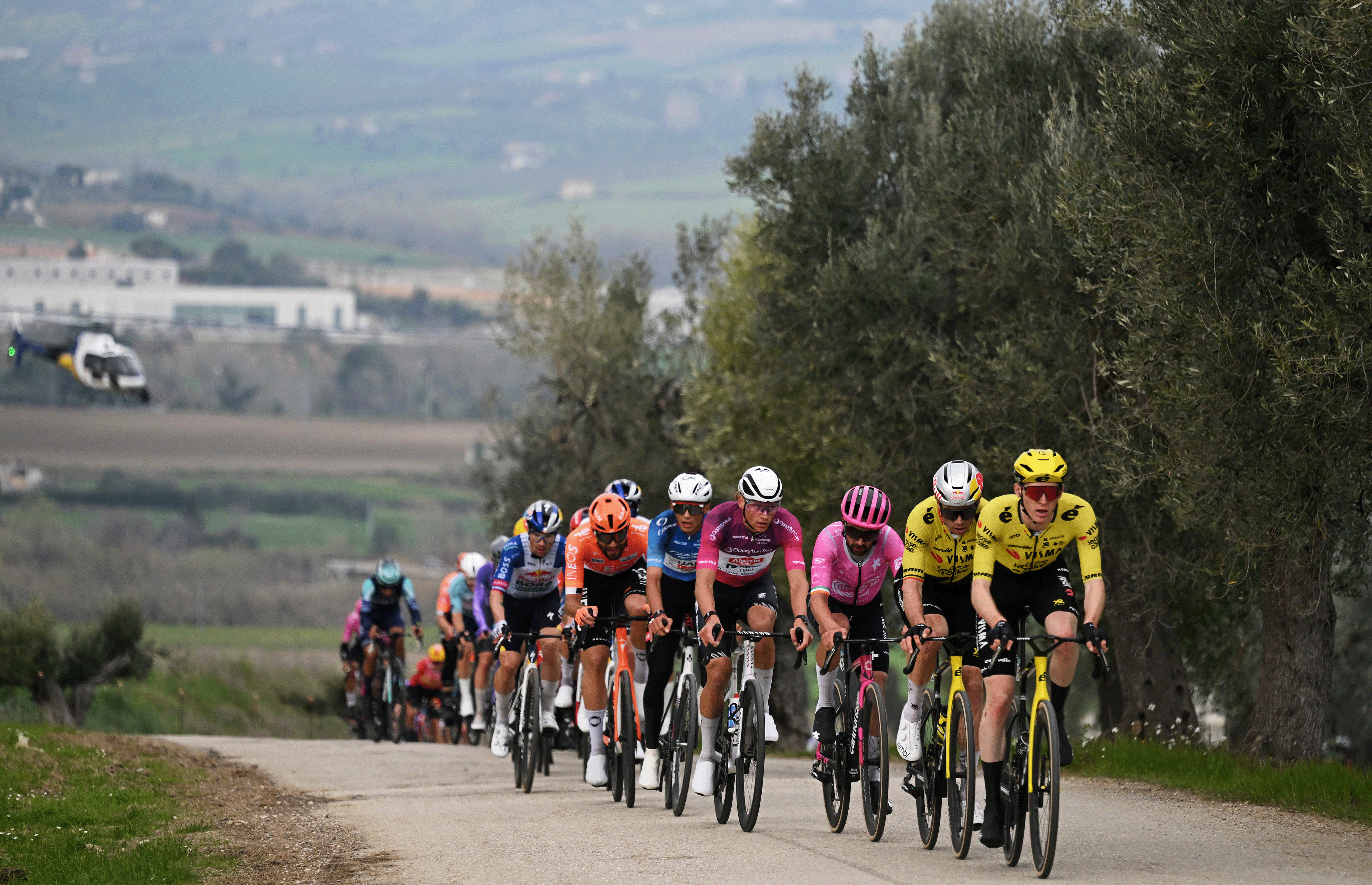 MARTINSICURO, ITALY - MARCH 12: (L-R) Isaac Del Toro of Mexico and UAE Team Emirates - XRG - Blue Leader Jerse, Mathieu van der Poel of Netherlands and Team Alpecin-Premier Tech - Purple Sprint Jersey, Ben Healy of Ireland and Team EF Education - EasyPost and Wout van Aert of Belgium and Matteo Jorgenson of United States and Team Visma | Lease a Bike compete during the 61st Tirreno-Adriatico 2026, Stage 4 a 213km stage from Tagliacozzo to Martinsicuro / #UCIWT / on March 12, 2026 in Martinsicuro, Italy. (Photo by Tim de Waele/Getty Images)