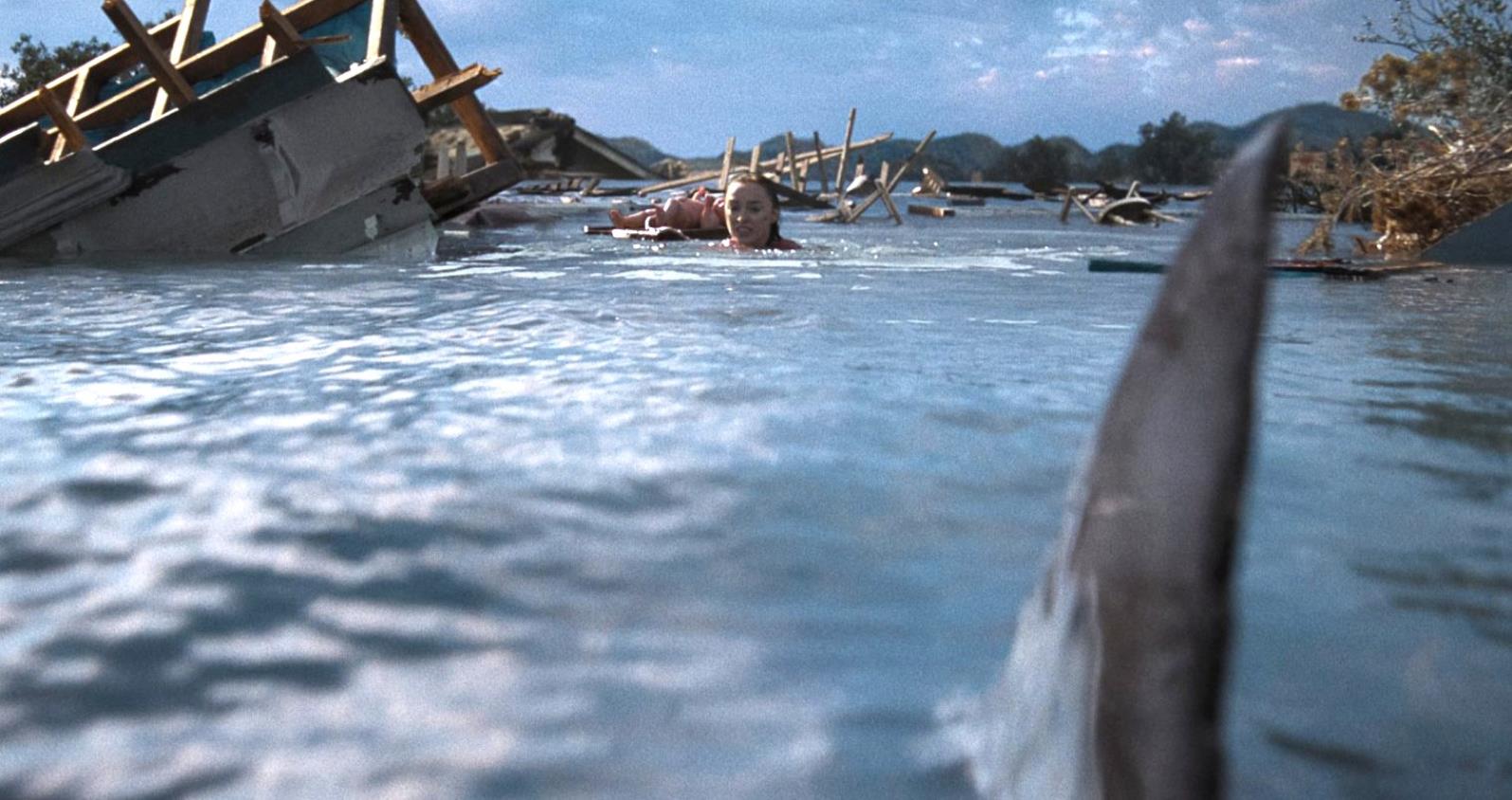 Phoebe Dynevor & Djimon Hounsou Fend Off Lethal Predators In First Trailer For Shark-Attack Thriller