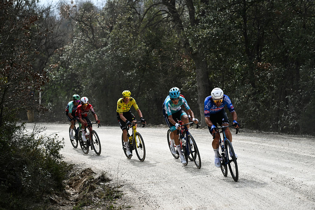 Riders lead the race during the 20th one-day classic 'Strade Bianche' (White Roads) men's cycling race between Siena and Siena in Tuscany on March 7, 2026. (Photo by Marco BERTORELLO / AFP)