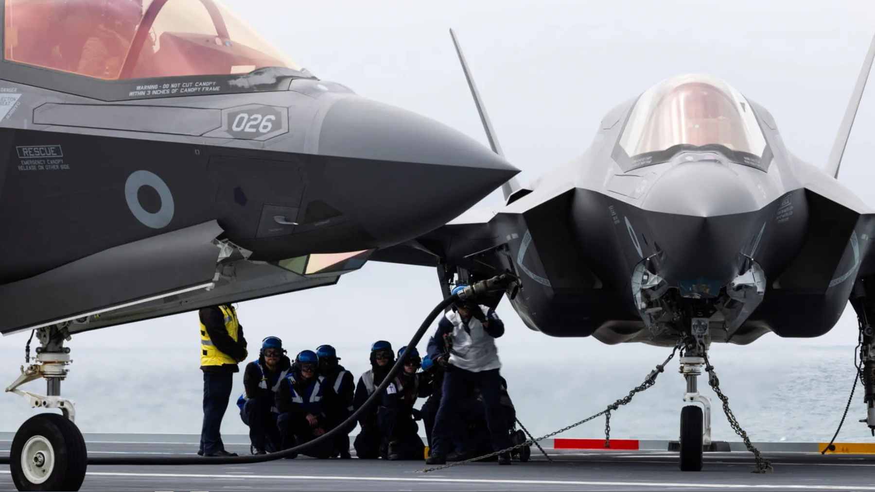 The British aircraft carrier HMS Prince of Wales navigating through icy Arctic waters during a naval deployment.