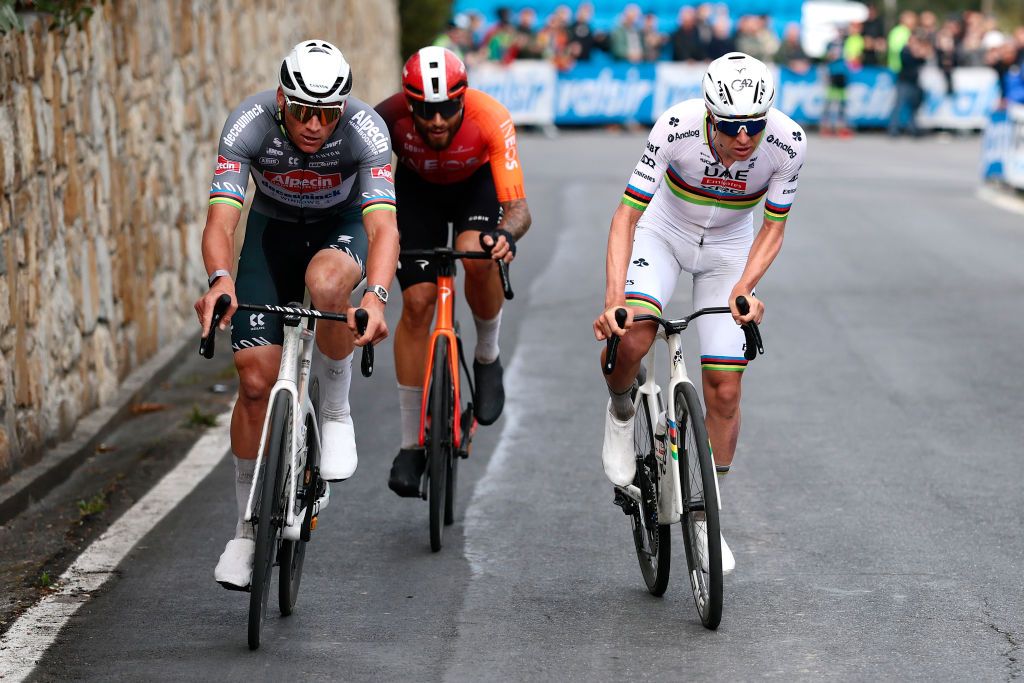 SANREMO, ITALY - MARCH 22: (L-R) Mathieu Van Der Poel of Netherlands and Team Alpecin &ndash; Deceuninck, Filippo Ganna of Italy and Team INEOS Grenadiers and Tadej Pogacar of Slovenia and Team UAE Team Emirates compete in the breakaway during the 116th Milano-Sanremo 2025 a 289km one day race from Pavia to Sanremo / #UCIWT / on March 22, 2025 in Sanremo, Italy. (Photo by Luca Bettini - Pool/Getty Images)