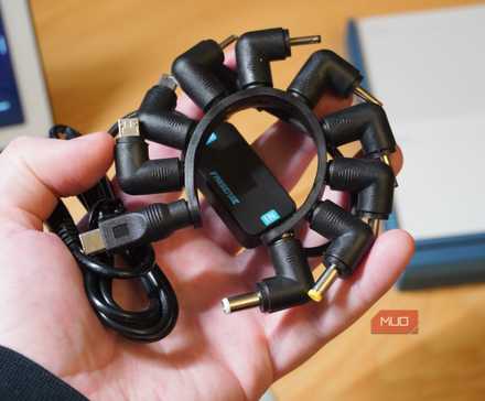 A 10-in-1 USB charging kit in the hand.