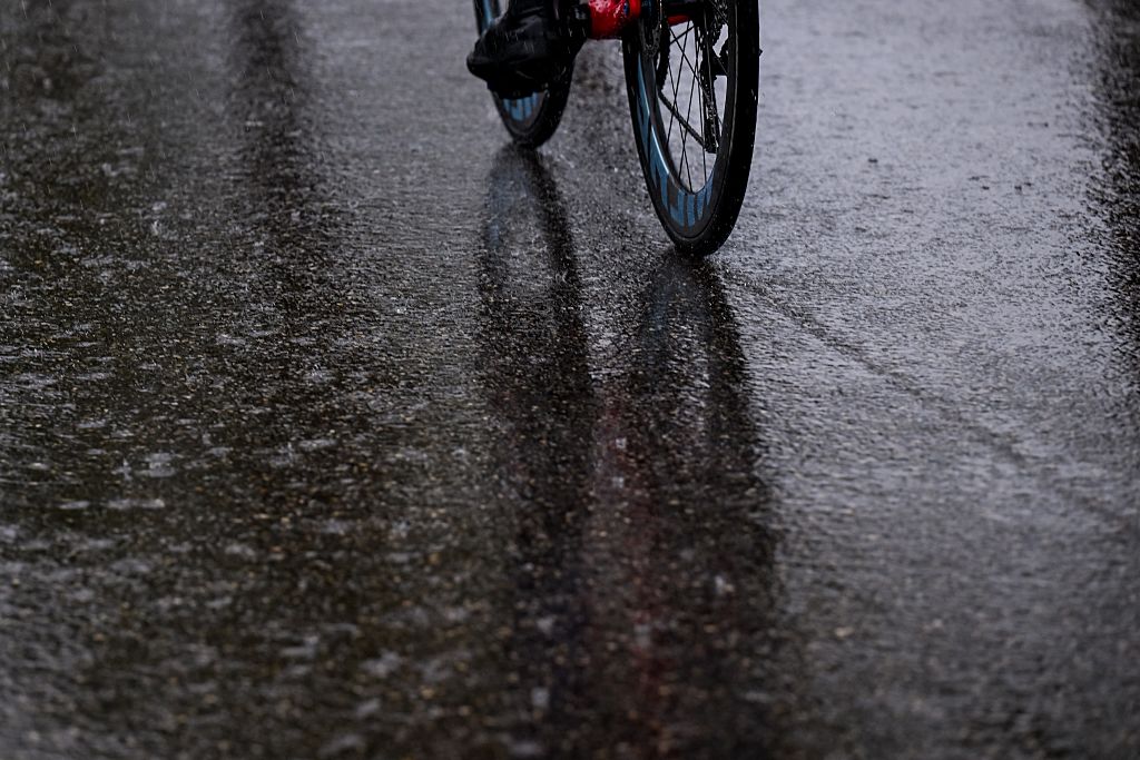 Picture shows the extreme rain conditions pictured before the start of the seventh stage of the 84th edition of the Paris-Nice cycling race, from Nice to Isola (120,4 km), on Saturday 14 March 2026. BELGA PHOTO DAVID PINTENS (Photo by DAVID PINTENS / BELGA MAG / Belga via AFP)