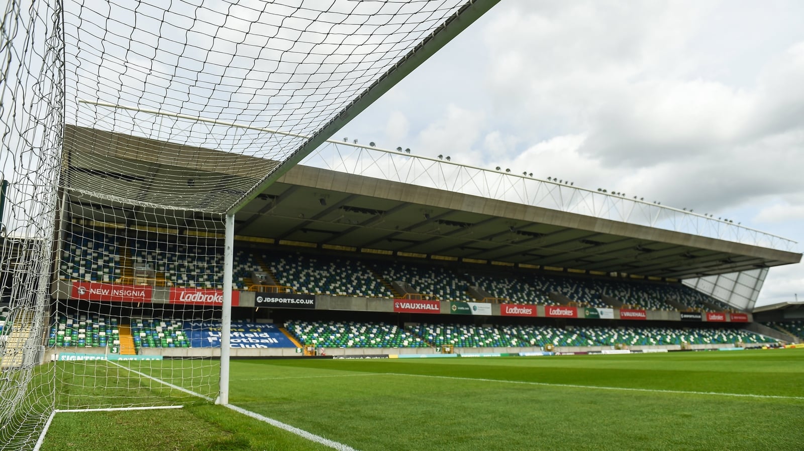 Child struck by bottle during disorder at Belfast match