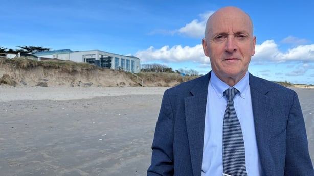 Bill Kelly standing on Rosslare Strand.