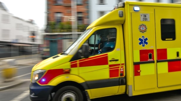 An ambulance seen in Dublin city center, during Ireland's third national lockdown. in Dublin city centre during Level 5 Covid-19 lockdown. Ireland's health service is potentially facing the most challenging week in its history with the number of Covid-19 patients requiring intensive care treatment h