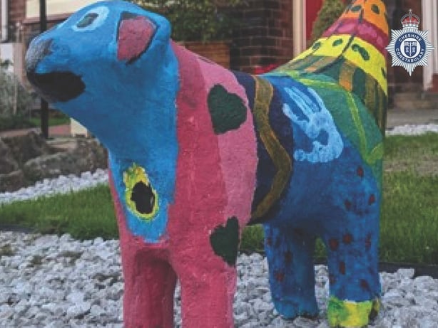a sculpture of a lamb crossed with a banana and brightly coloured