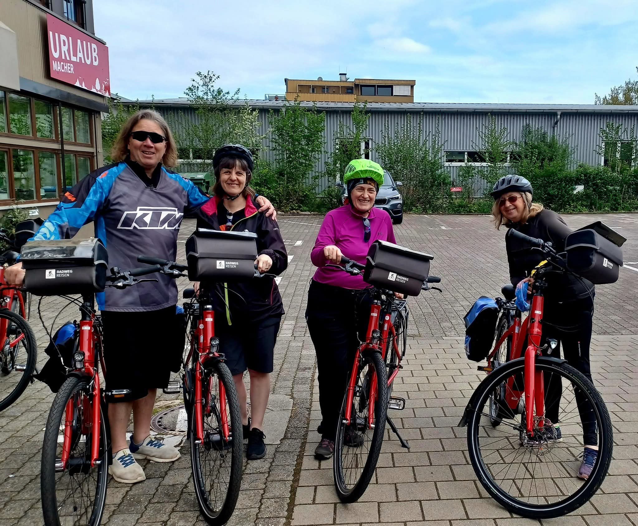 Ms Warren on a bike with Lisa, her brother Gary and sister-in-law Teresa
