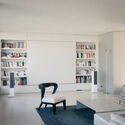 © Stijn Bollaert Apartment A / heros - Interior Photography, Living Room, Shelving, Sofa, Chair