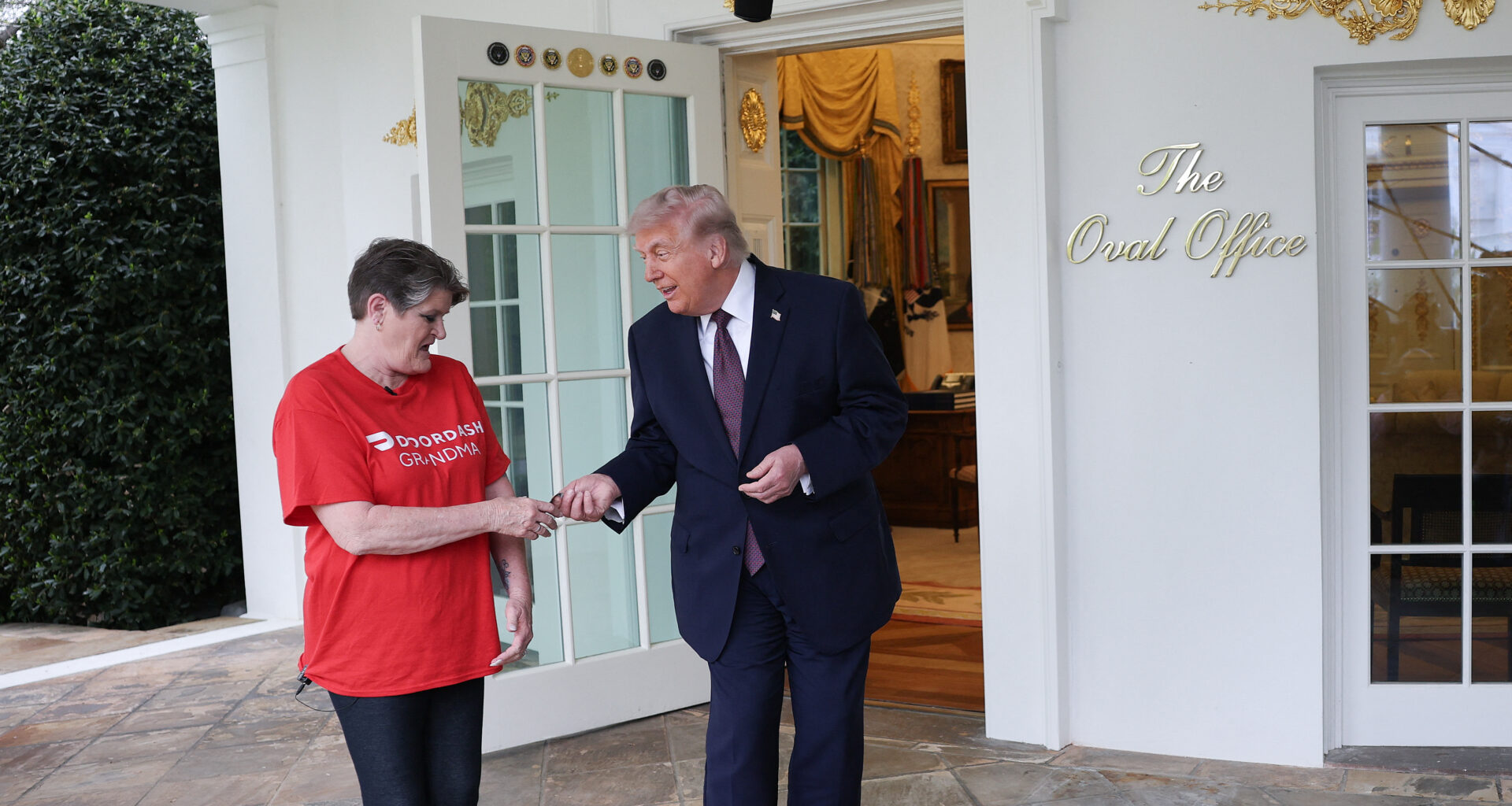 Trump’s McDonald’s stunt with DoorDash grandma sparks backlash over US healthcare costs