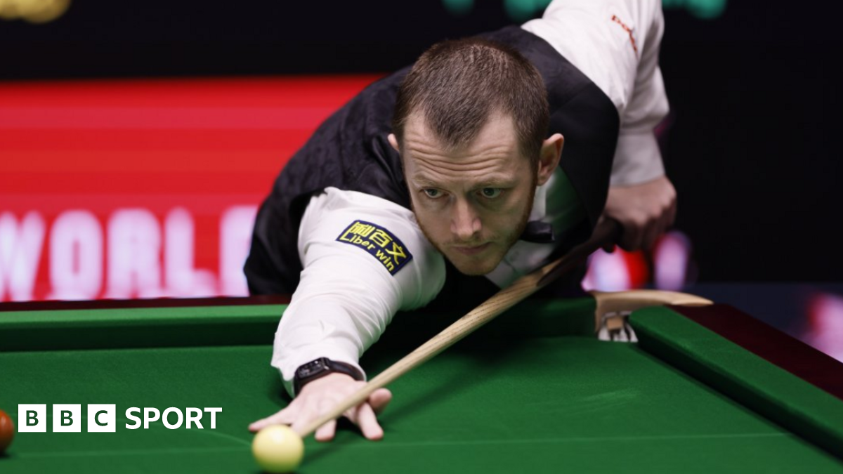 Mark Allen strikes the white at the snooker table