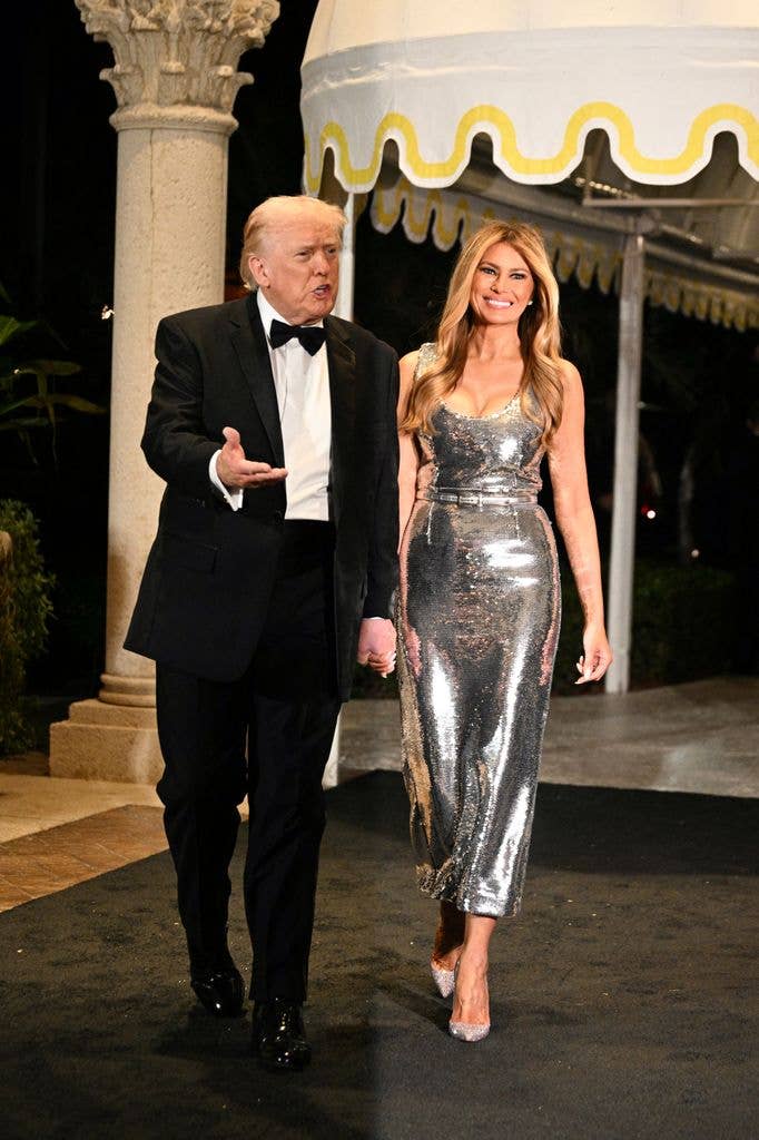 US President Donald Trump and First Lady Melania Trump attend the New Year's Eve Party at his Mar-a-Lago residence in Palm Beach, Florida 