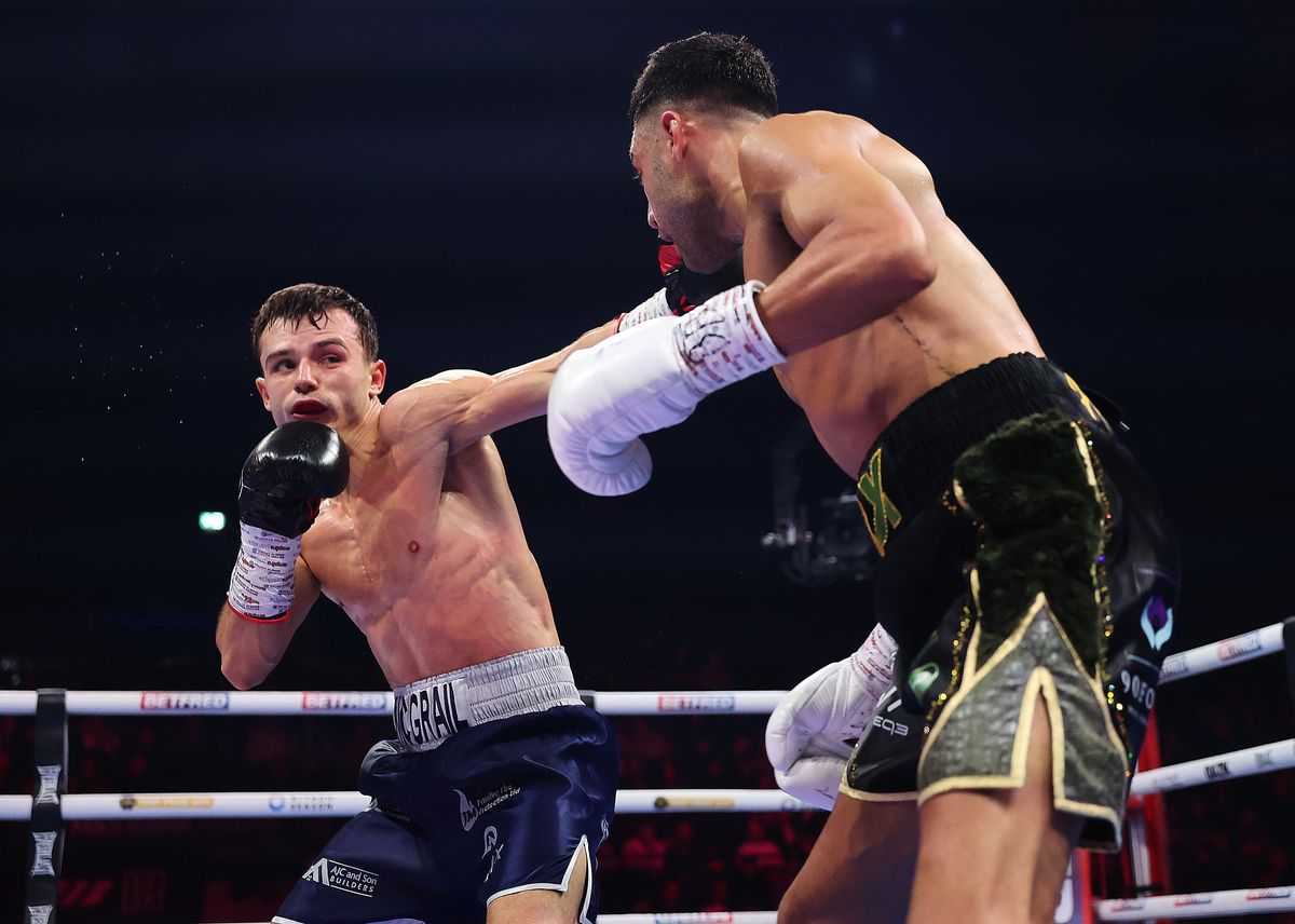 Joe McGrail lands a shot on Aaron Hayden