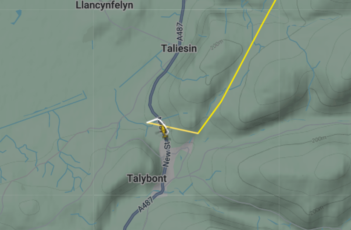 An air ambulance has landed at the scene