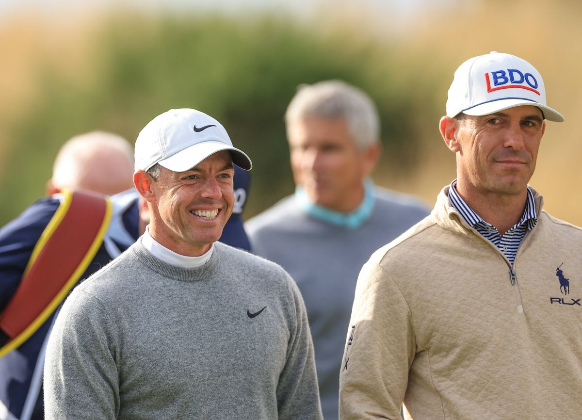 ST ANDREWS, SCOTLAND - OCTOBER 04: Rory McIlroy of Northern Ireland and Billy Horschel of The United States walk off the tee on the first hole on day two of the Alfred Dunhill Links Championship 2024 at Kingsbarns Golf Club on October 04, 2024 in Kingsbarns, Scotland. (Photo by David Cannon/Getty Images)