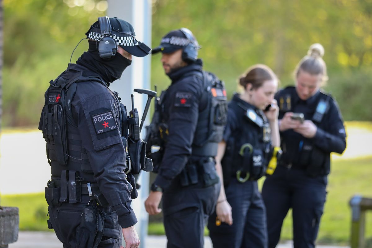 Armed police on Broadmoss Drive