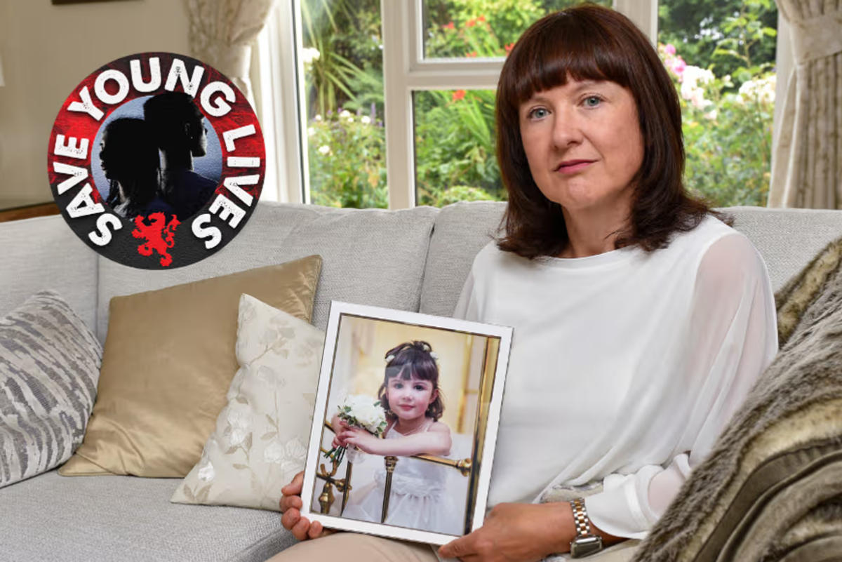 Ruth with a picture of her little girl Sophie