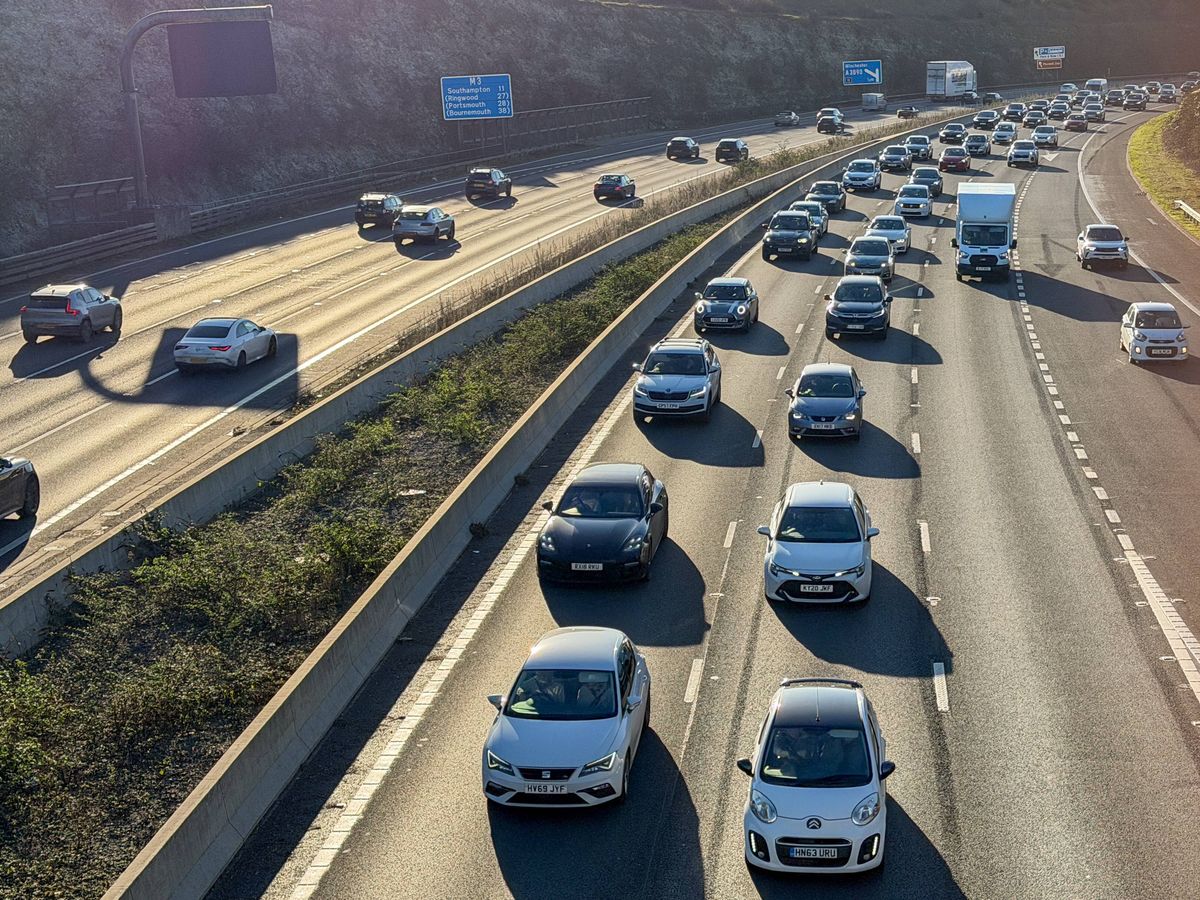 WINCHESTER, UNITED KINGDOM - DECEMBER 27: Vehicles queue in a traffic jam on the M3 motorway on December 27, 2025 near Winchester, England. The M3 motorway, which links the seaports of southern England to the M25 is a major transport link for the region. (Photo by Anna Barclay/Getty Images)