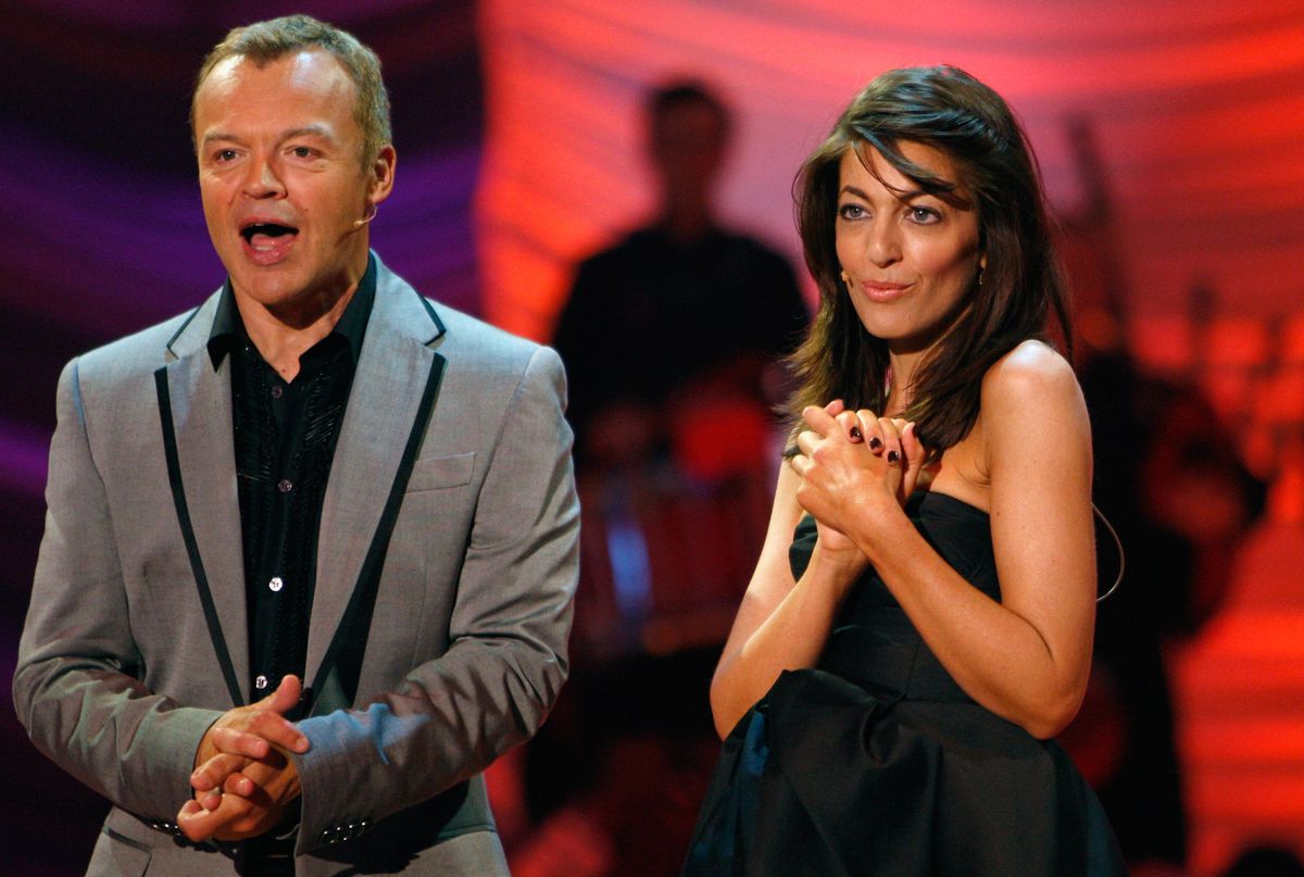 GLASGOW, UNITED KINGDOM - SEPTEMBER 05:  Television presenters Claudia Winkleman (R) and Graham Norton host the Eurovision dance contest dress rehearsal September 5, 2008 in Glasgow, Scotland. Twenty-eight dancers from 14 countries are being represented in the show, which will be televised live on BBC1 tomorrow.   (Photo by Jeff J Mitchell/Getty Images)