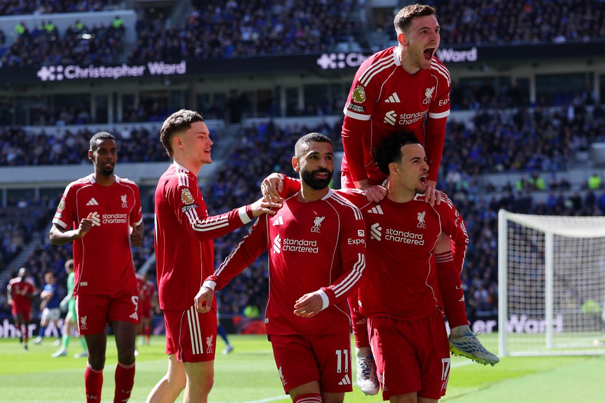 Mohamed Salah of Liverpool celebrates scoring his team's first goal against Everton