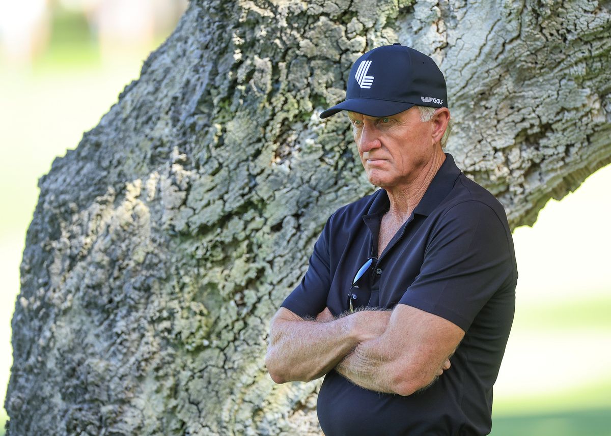 Greg Norman watches on
