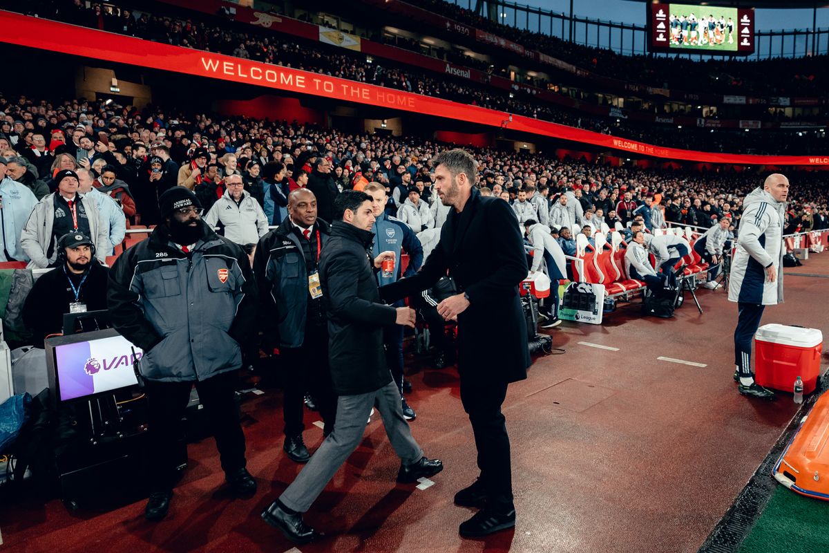 Michael Carrick greets Mikel Arteta before Manchester United's victory over Arsenal earlier this season