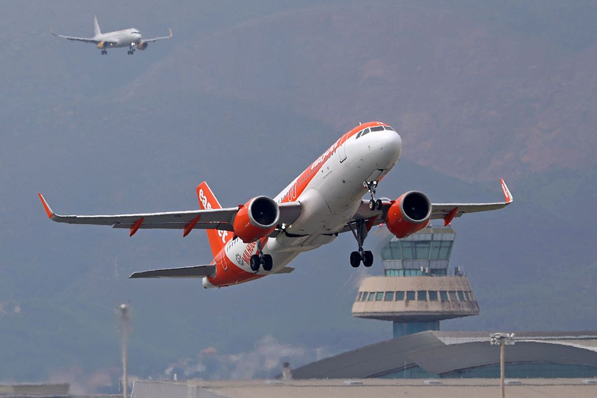 An easyJet (Basel-Mulhouse Sticker) Airbus A320-251N takes off