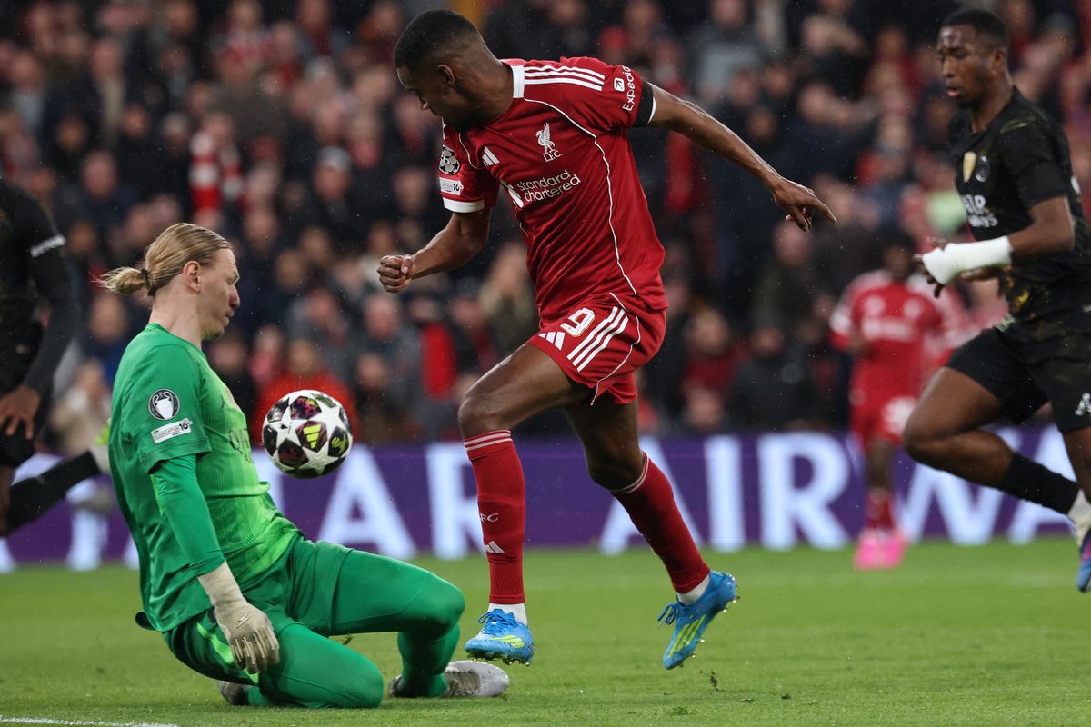 Liverpool's Swedish striker #09 Alexander Isak (C) tries to go around Paris Saint-Germain's Russian goalkeeper #39 Matvey Safonov
(L) during the UEFA Champions League quarter final, second-leg football match between Liverpool and Paris Saint-Germain at Anfield in Liverpool, north west England on April 14, 2026