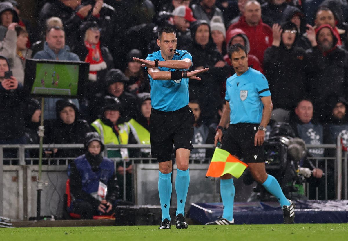 Referee Maurizio Mariani overturns his original decision