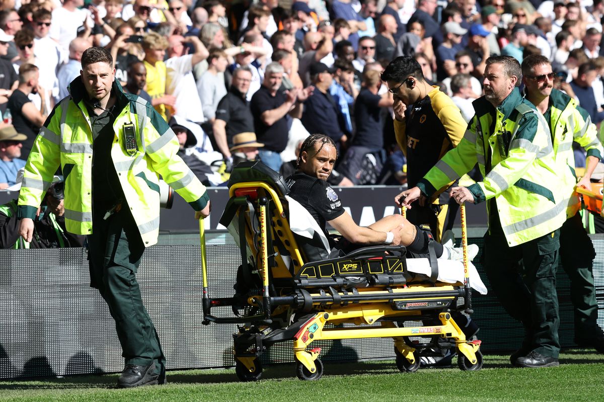 Xavi Simons was stretchered off during Tottenham's win over Wolves