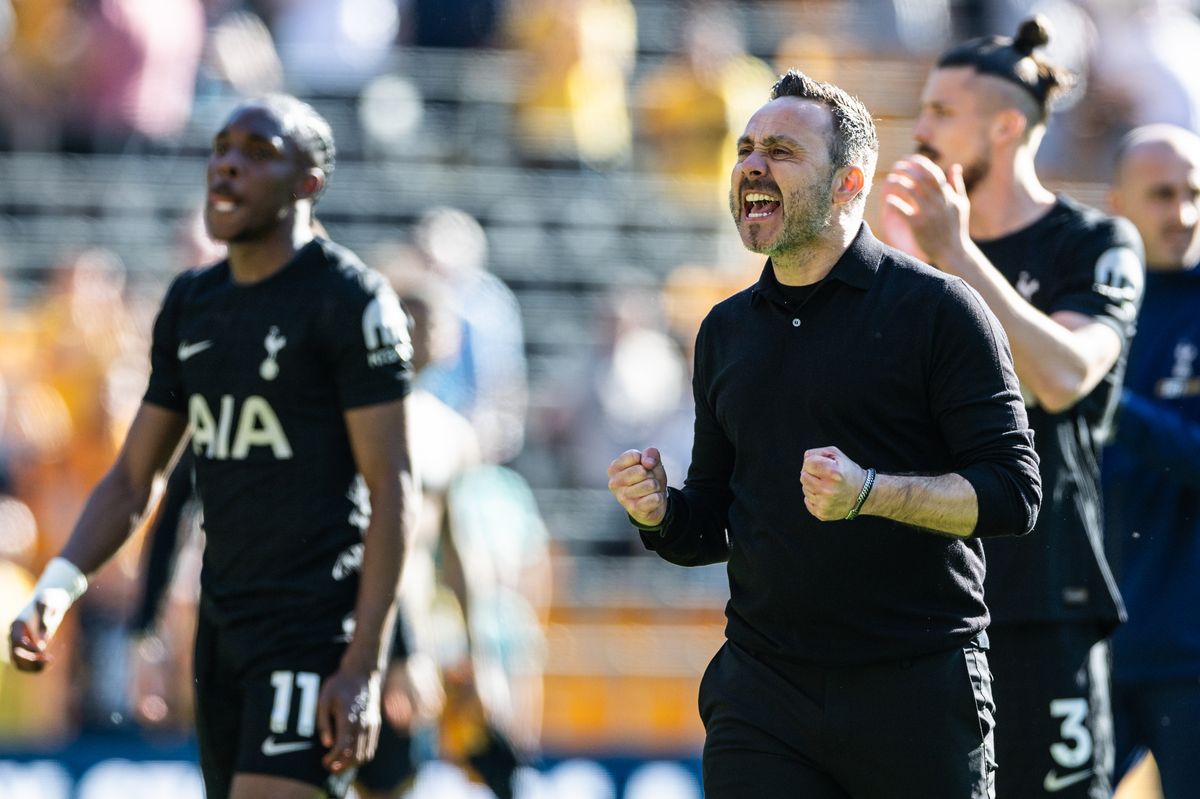 Tottenham Hotspur boss Roberto De Zerbi celebrates victory with the fans at the end of the Premier League match against Wolverhampton Wanderers at Molineux