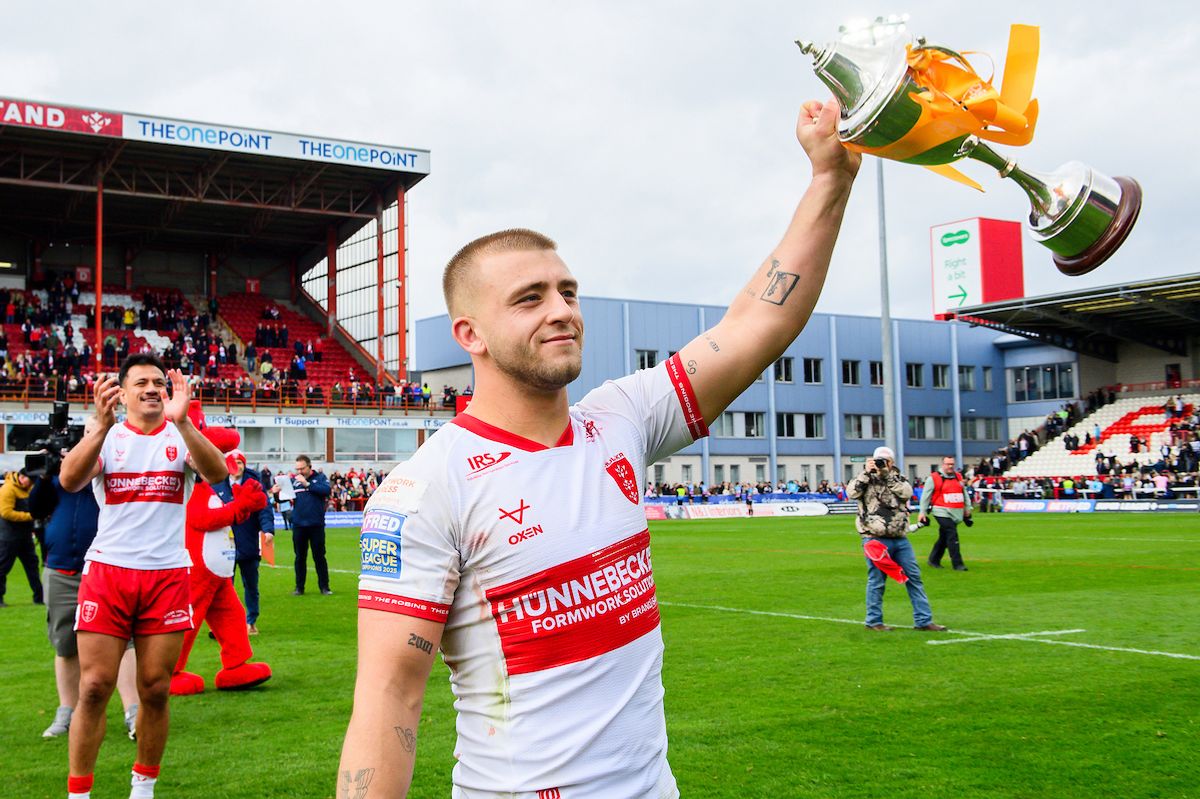 Hull KR's Mikey Lewis with the Clive Sullivan trophy after victory over Hull FC.