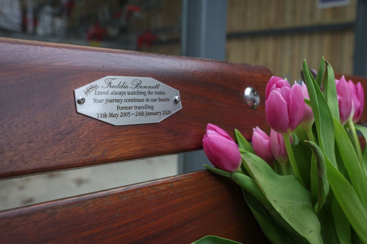 A general view of a memorial plaque on a bench at Beeston Train Station in memory of Freddie Bennett.