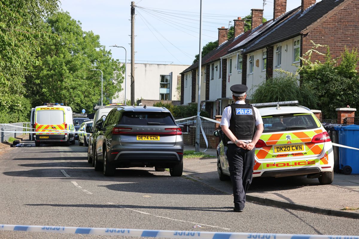 Merseyside Police scene after double stabbing in Huyton on Tobruk Road.