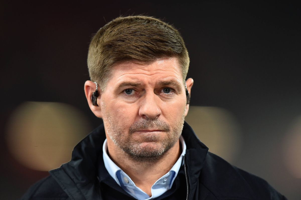 Steven Gerrard looks on