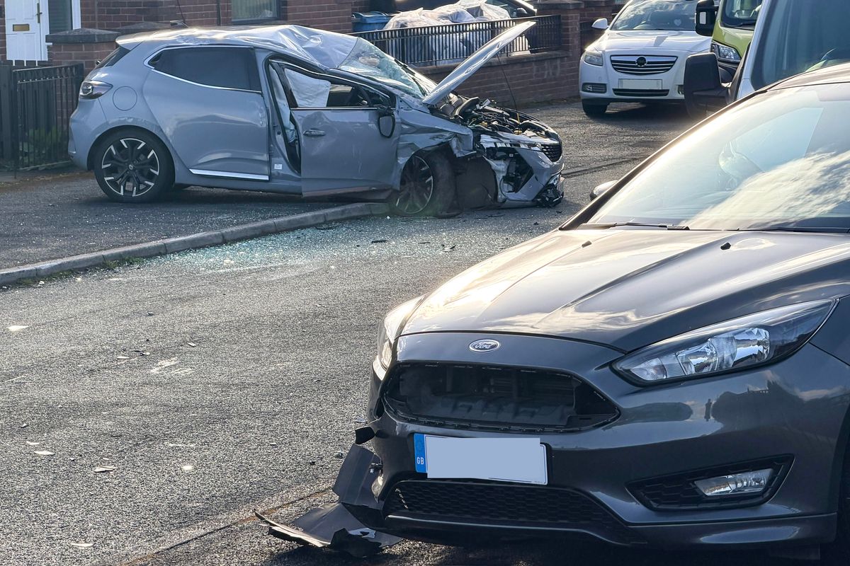 A grey Ford also suffered damage