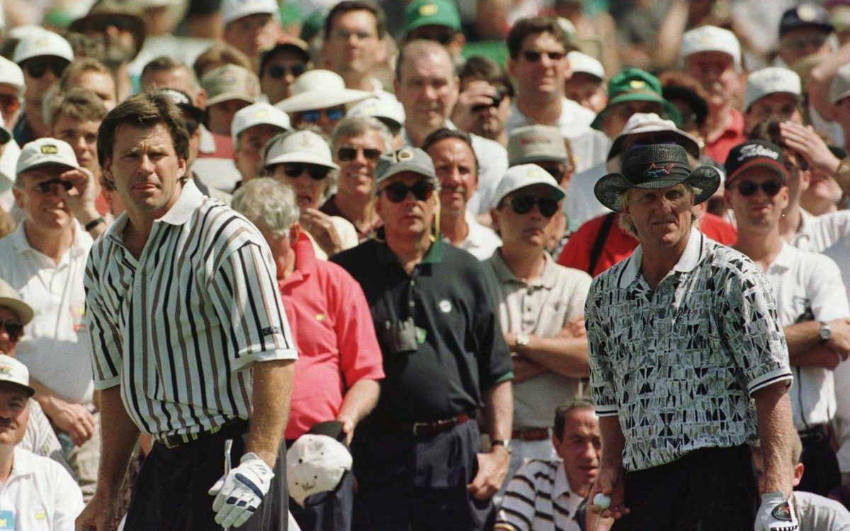 Nick Faldo of England and Greg Norman of Australia stand together on the third tee during the final round of the 1996 Masters at Augusta National Golf Club in Augusta