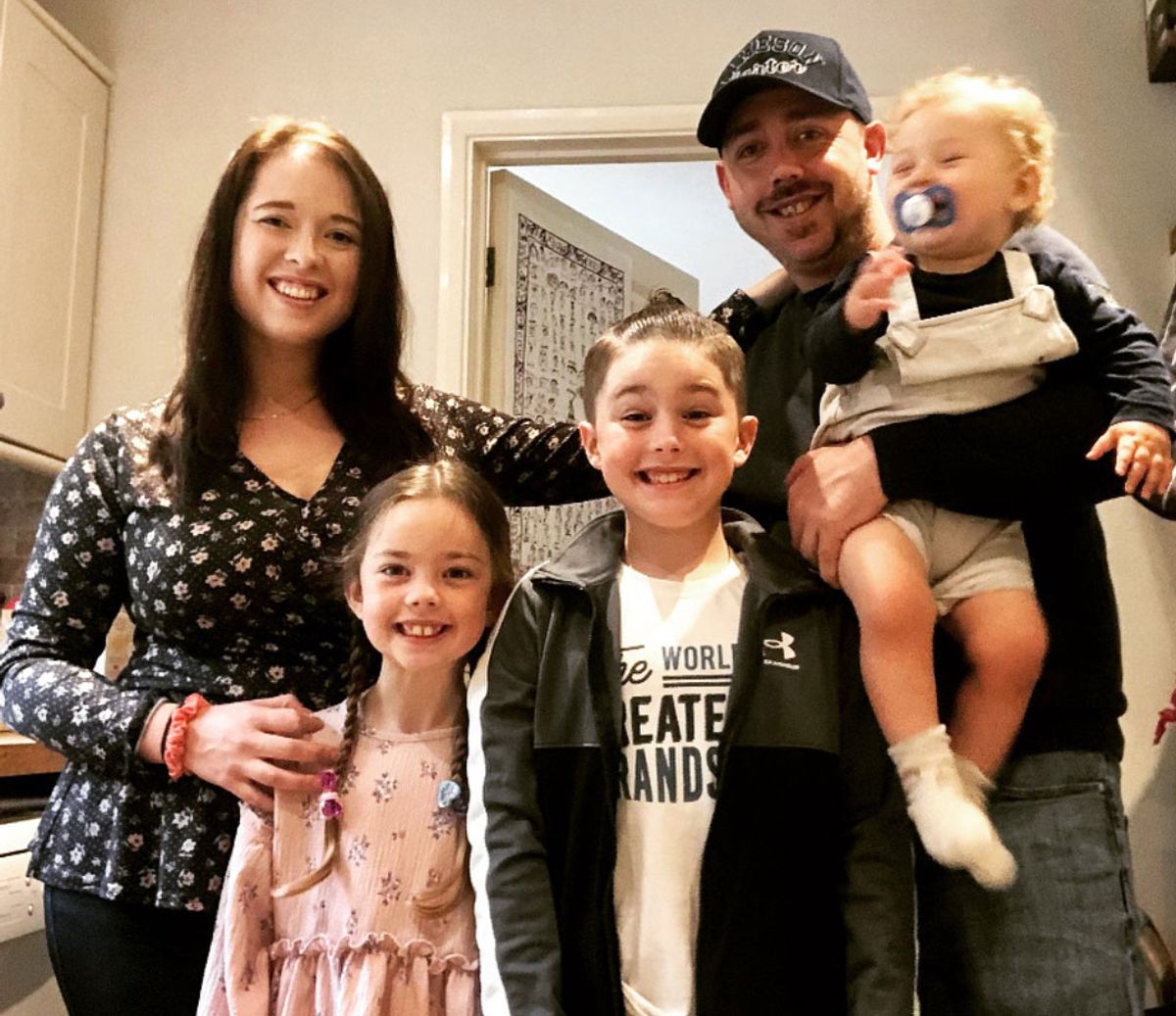 Chloe is pictured with Edison, her two other children and partner Aran Pierce