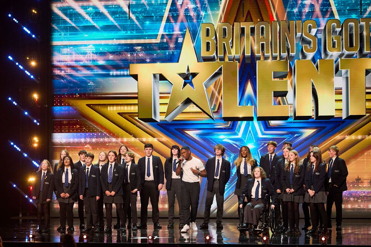 Ben and pupils performing for the show which will be aired tonight